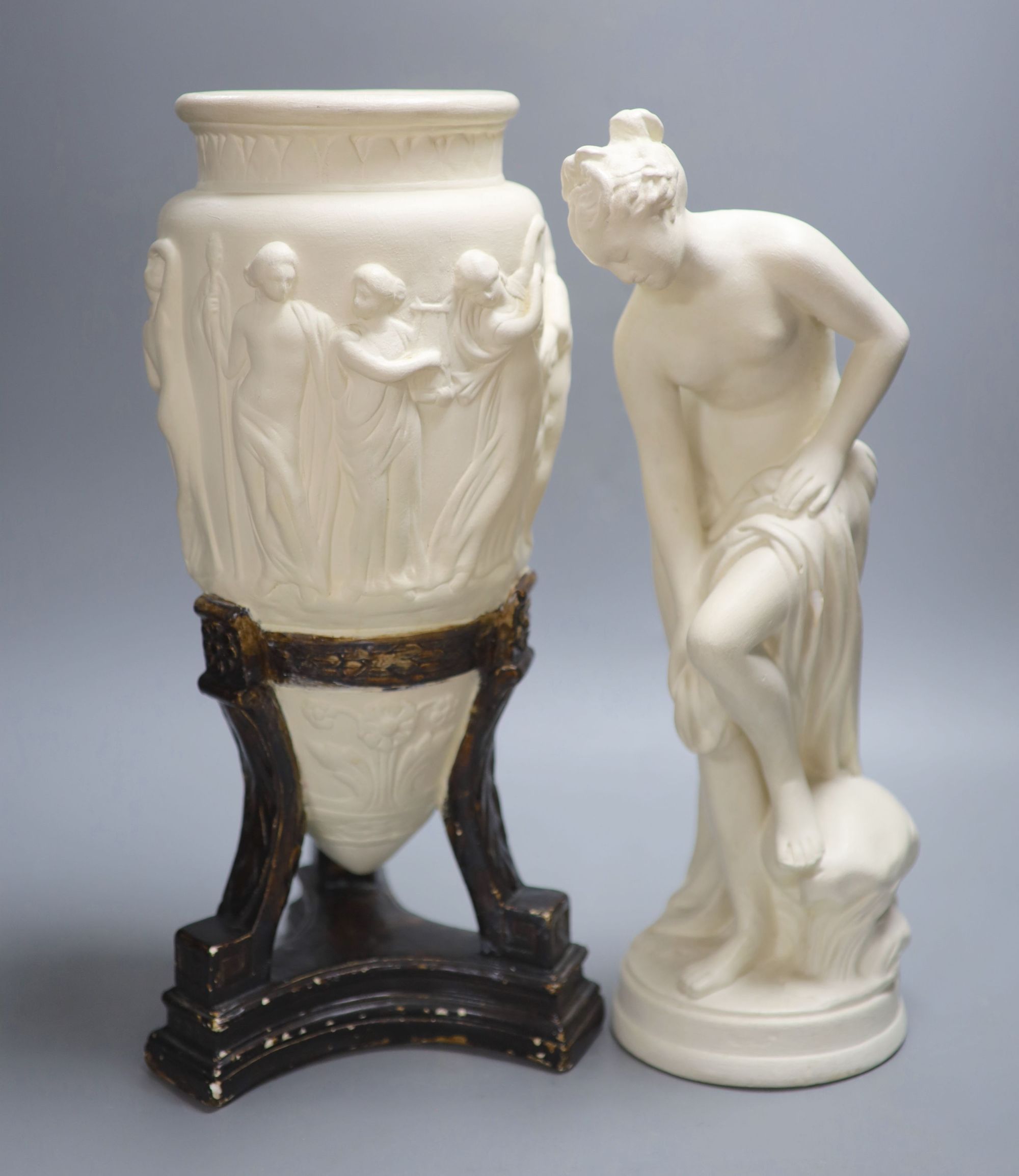 A classical plaster figure and a similar classical vase on stand, tallest 44cm